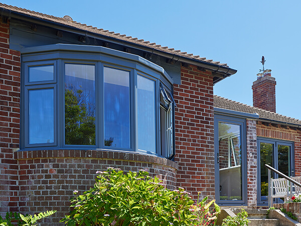 A grey bay casement window